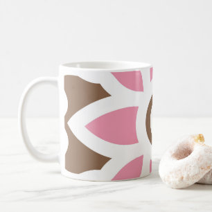 a pink flower on a brown background coffee mug