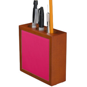 A pink square with a crisp white border, presentin desk organizer