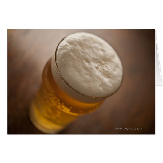 A pint of lager, back lir shallow focus rustic cards (Front Horizontal)
