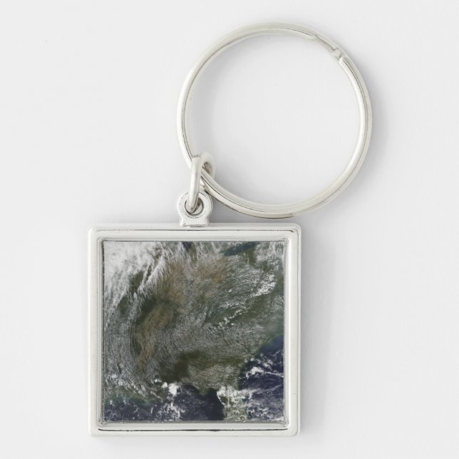 A pinwheel-like pattern of high pressure clouds keychain (Front)