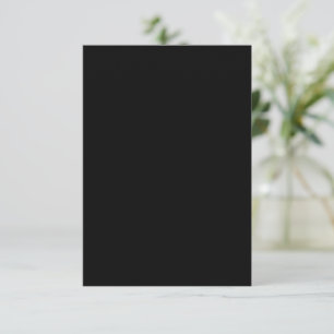 A plain dark gray textured fabric fills the frame