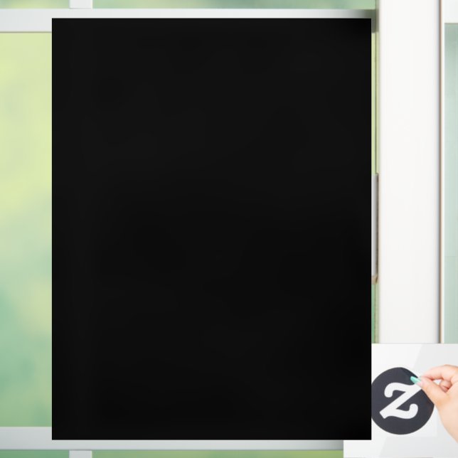 A plain dark textured background with subtle  window cling (Home)