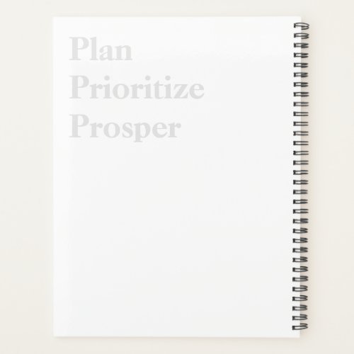 A planner with a Lily of the Valley design theme