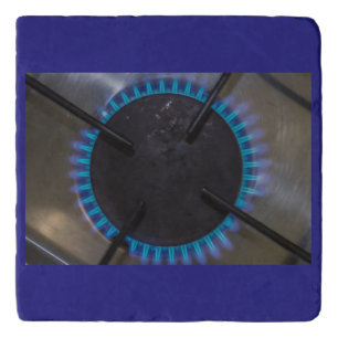 a plate gas lit on marble stone trivet