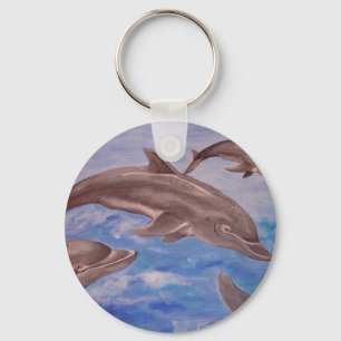 A Pod of Playful Jumping Dolphins Keychain