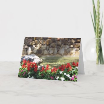 A Pond With Red Flowers - Greeting Card by DonnaGrayson at Zazzle