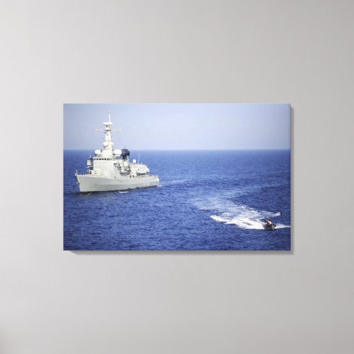 A Portuguese navy team in an inflatable boat Canvas Print