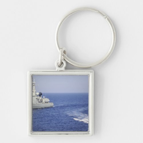 A Portuguese navy team in an inflatable boat Keychain