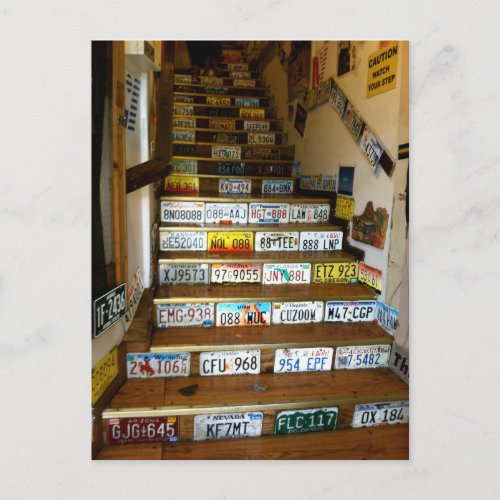 A postcard of stairs made with license plates