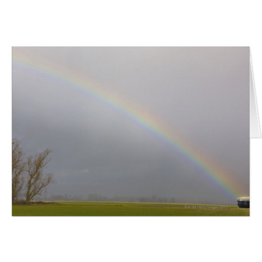 A pot of gold sits at a rainbows end cards (Front Horizontal)