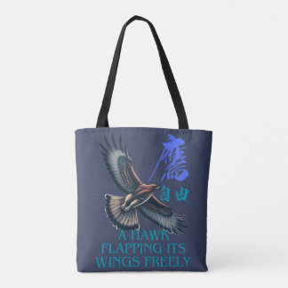 A powerful flying hawk symbolizing freedom tote bag