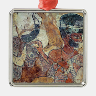 A priest leading a bull to sacrifice metal ornament