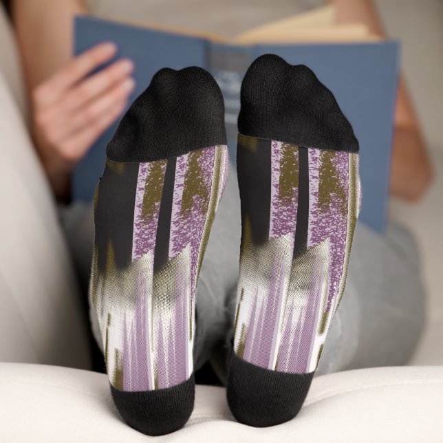 A pristine lake nestled among snow-capped mountain socks (Bottom)