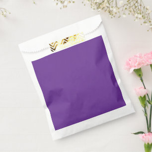 a purple background with a favor bag
