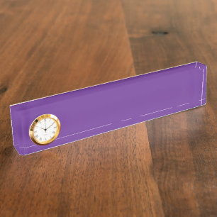 a purple background with a white border desk name plate