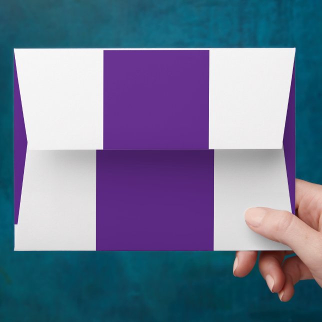 a purple background with a white border envelope (Hand)