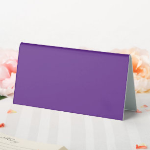 a purple background with a white border table tent