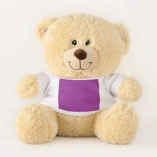 a purple background with a white border teddy bear