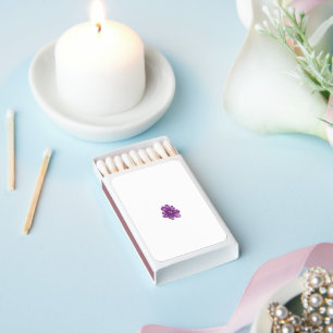 a purple flower on a white background matchboxes