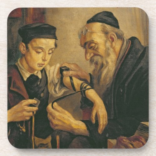 A Rabbi tying the Phylacteries to the arm of a boy Beverage Coaster