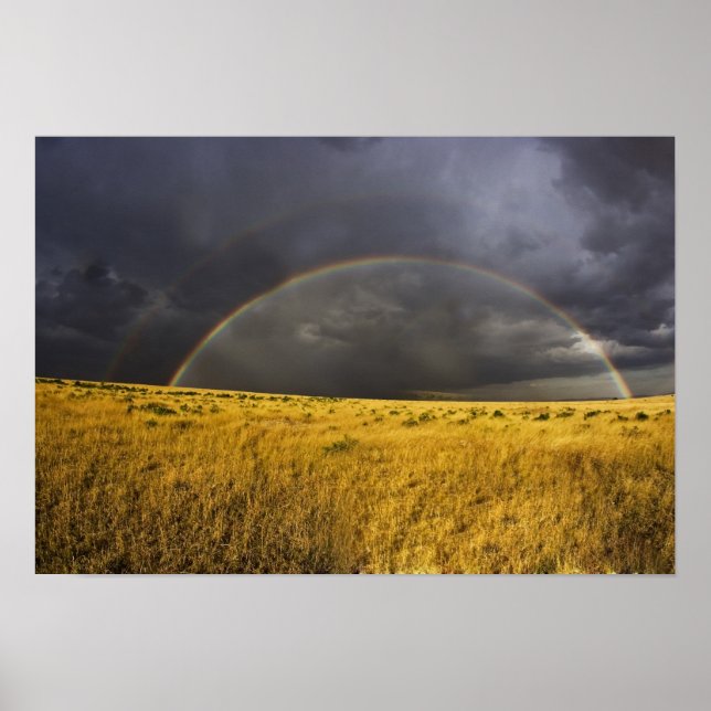 A rainbow appearing through a misty after noon poster (Front)