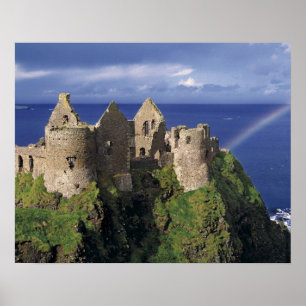 A rainbow strikes medieval Dunluce Castle on Poster