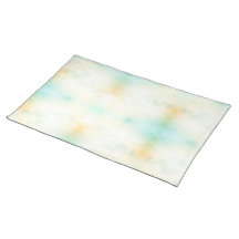 A rectangular doormat features a soft watercolor