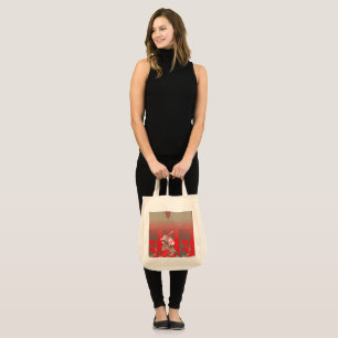 a red and beige scarf with a picture of a woman ho tote bag