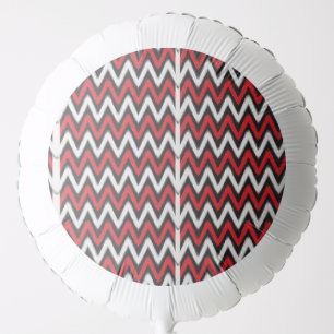 a red and black zigzag pattern on a white backgrou balloon