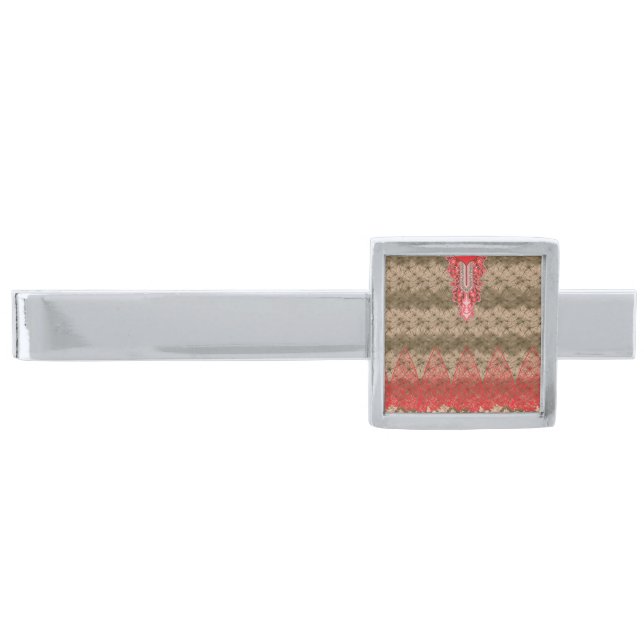 a red and brown background with a red border silver finish tie bar (Front)