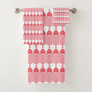 A red and pink geometric pattern featuring interlo bath towel set