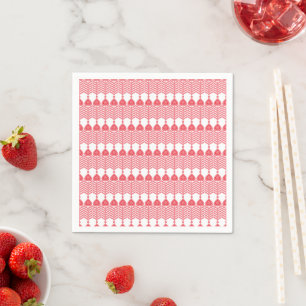 A red and pink geometric pattern featuring interlo napkins