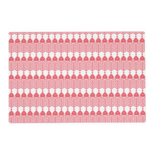 A red and pink geometric pattern featuring interlo placemat