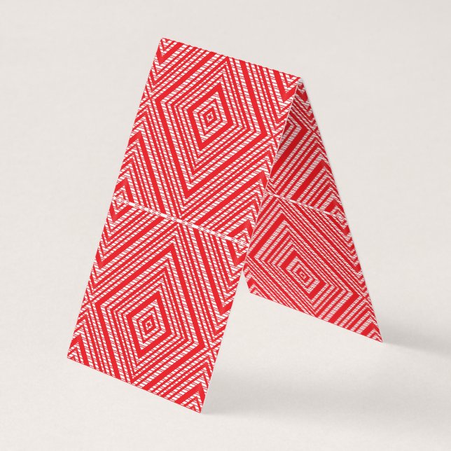 a red and white background with a diamond pattern business card (Back)