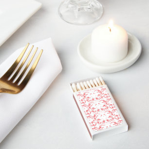 a red and white background with a pattern matchboxes