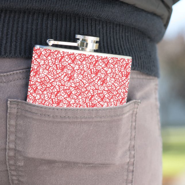 a red and white background with small white dots flask (In Situ)