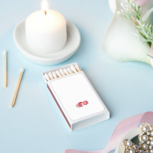 a red and white drawing of a flower matchboxes