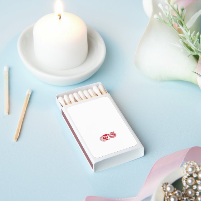a red and white drawing of a flower matchboxes (Insitu)