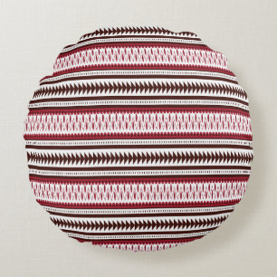 a red and white striped pattern round pillow
