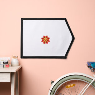 a red and yellow flower with black dots pennant