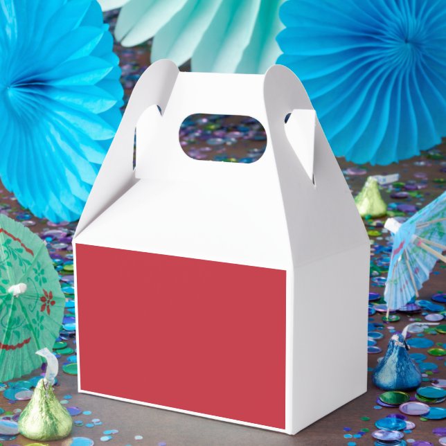 a red background with a favor boxes (Party)
