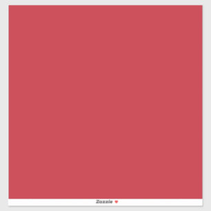 a red background with a sticker