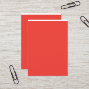 a red background with a white border business card