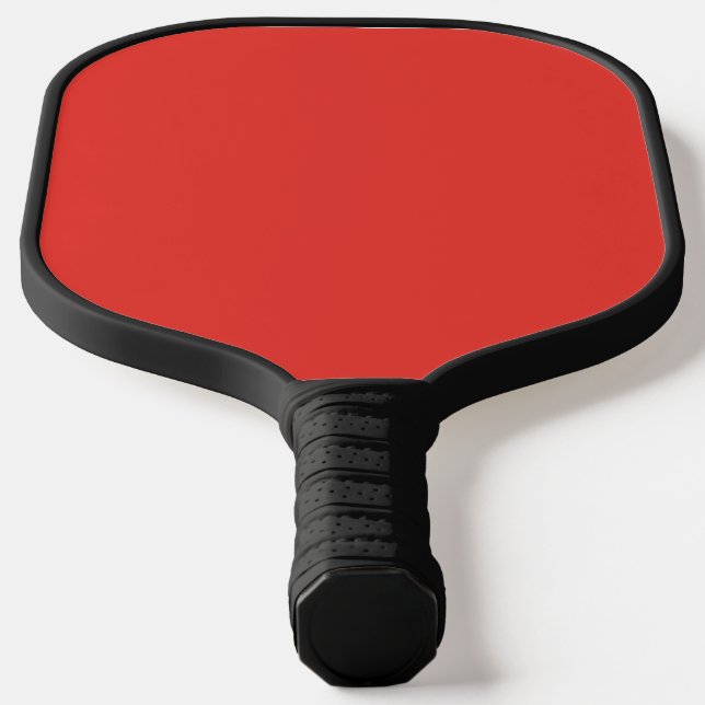 a red background with a white border pickleball paddle (Laydown)