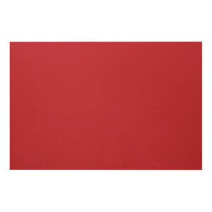 a red background with a wood wall art