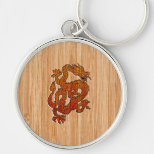 A red Dragon on Bamboo like Keychain