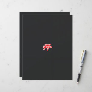 a red flower on a black background