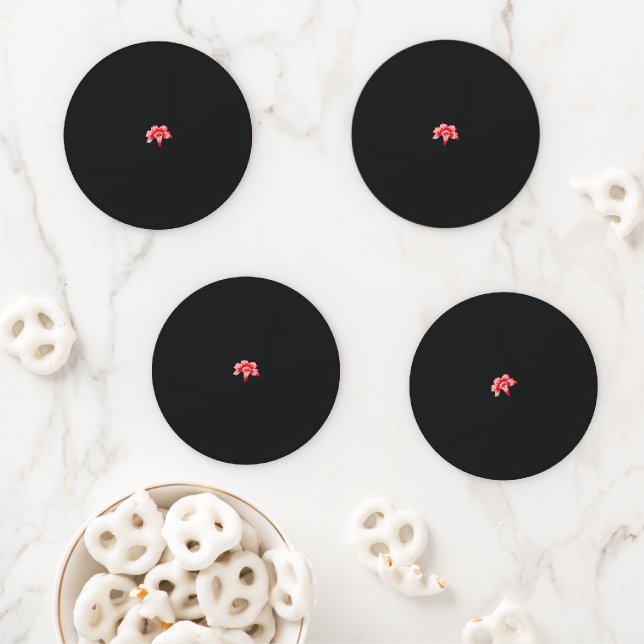 a red flower on a black background coaster set (In Situ)