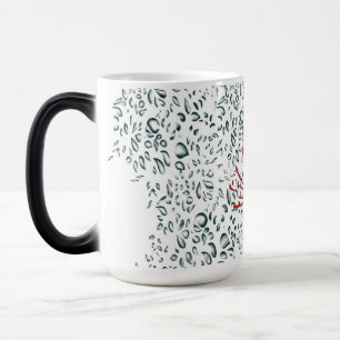 a red flower on a black background color morph mug 