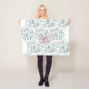 a red flower on a black background fleece blanket